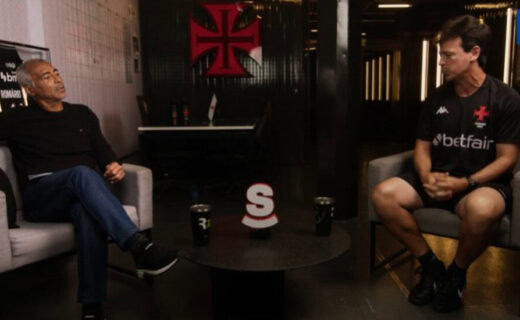 Vasco da Gama em debate, dois homens conversando.