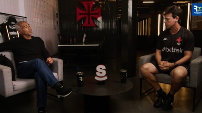 Vasco da Gama em debate, dois homens conversando.