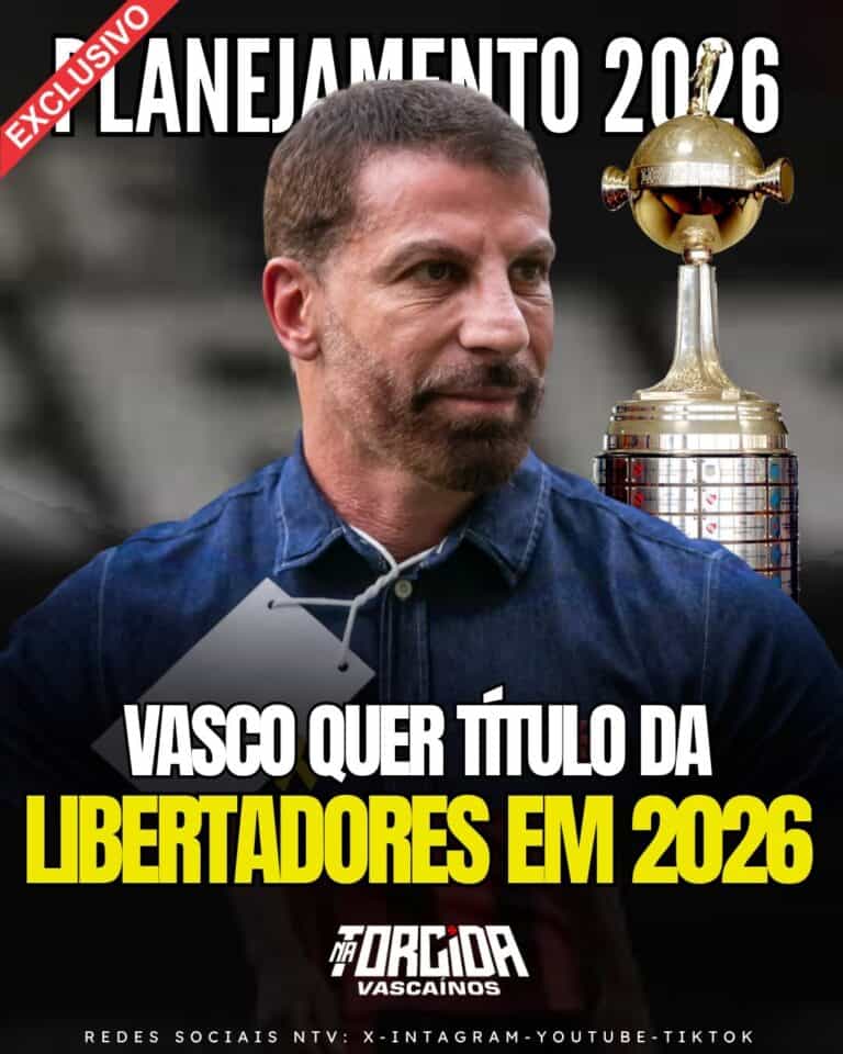 Vasco treinador com troféu de campeonato.