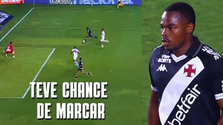 Goleiro do Vasco observando jogo no campo.